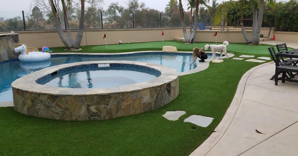 backyard artificial grass landscaping and putting green