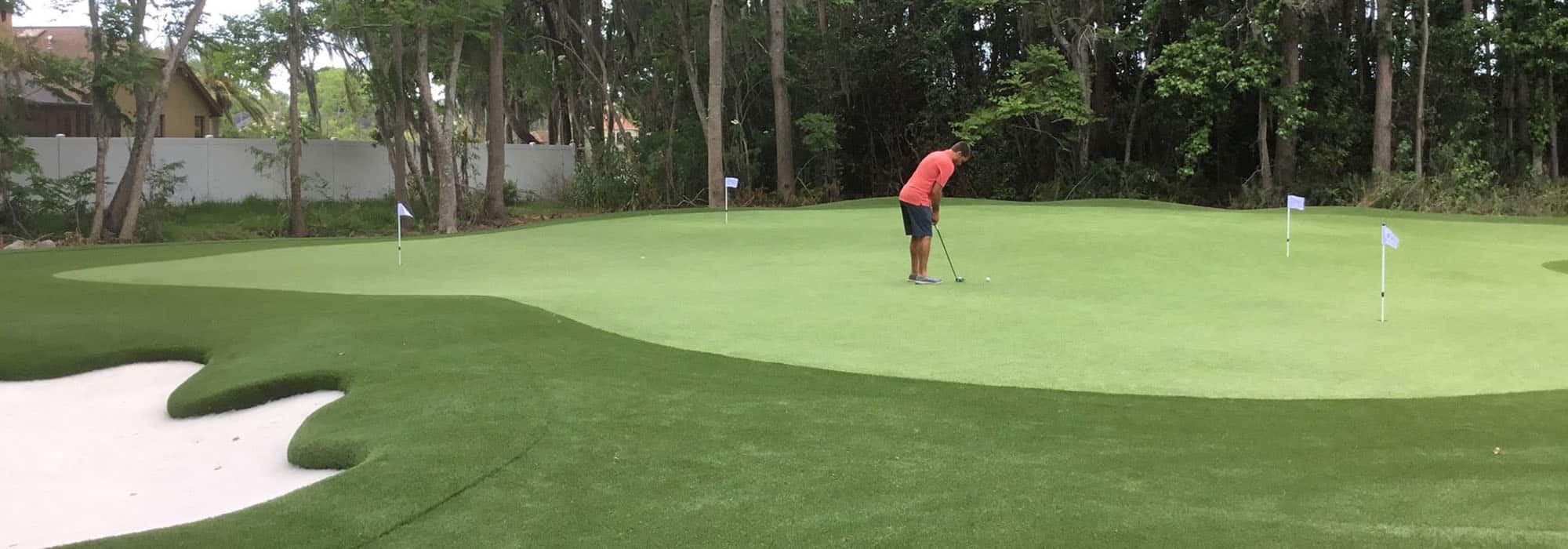 putting practice in private backyard putting green