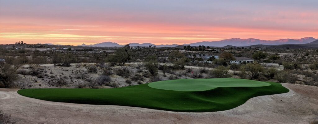 Private Backyard Putting Green in artificial grass at sunset