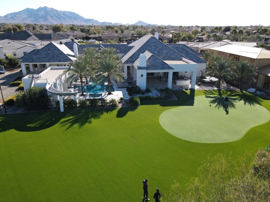artificial grass backyard with putting green